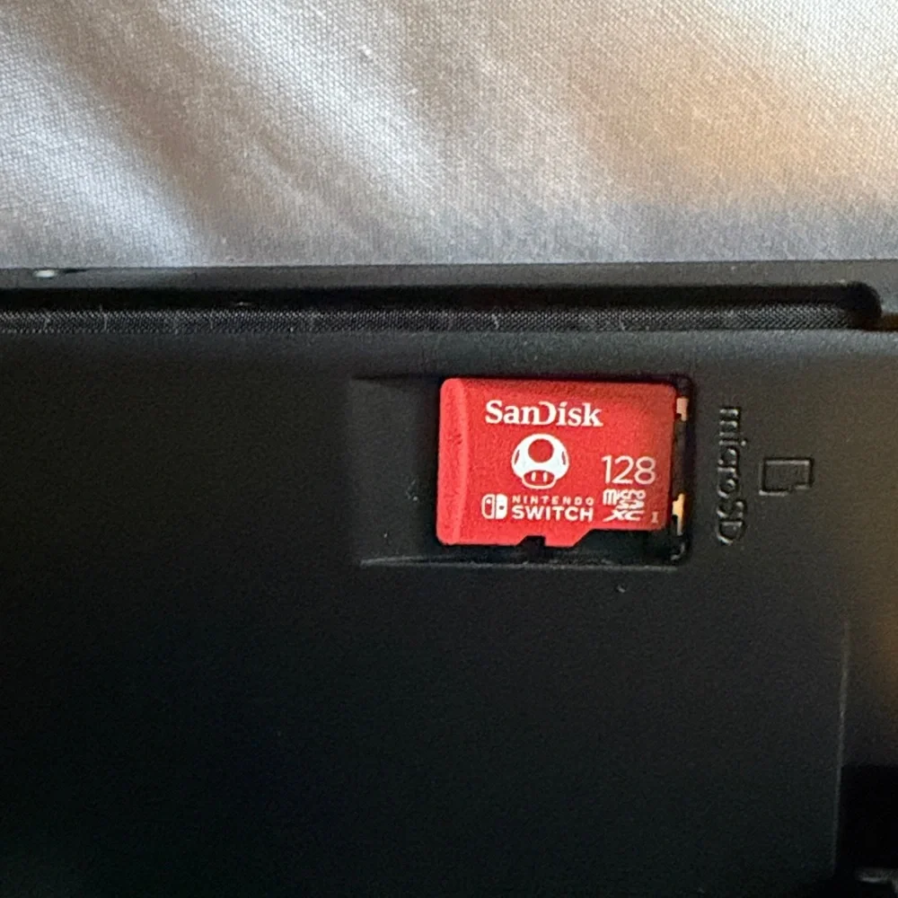 Nintendo oled included with HDMI wire and usb charger